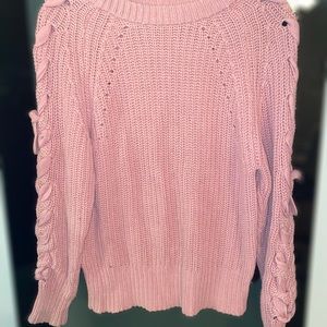Light pink sweater. Medium thick.